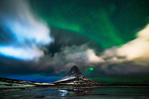 Iceland Northern Lights Aurora Borealis over Kirkjufell mountain on the western peninsula January 2024 winter